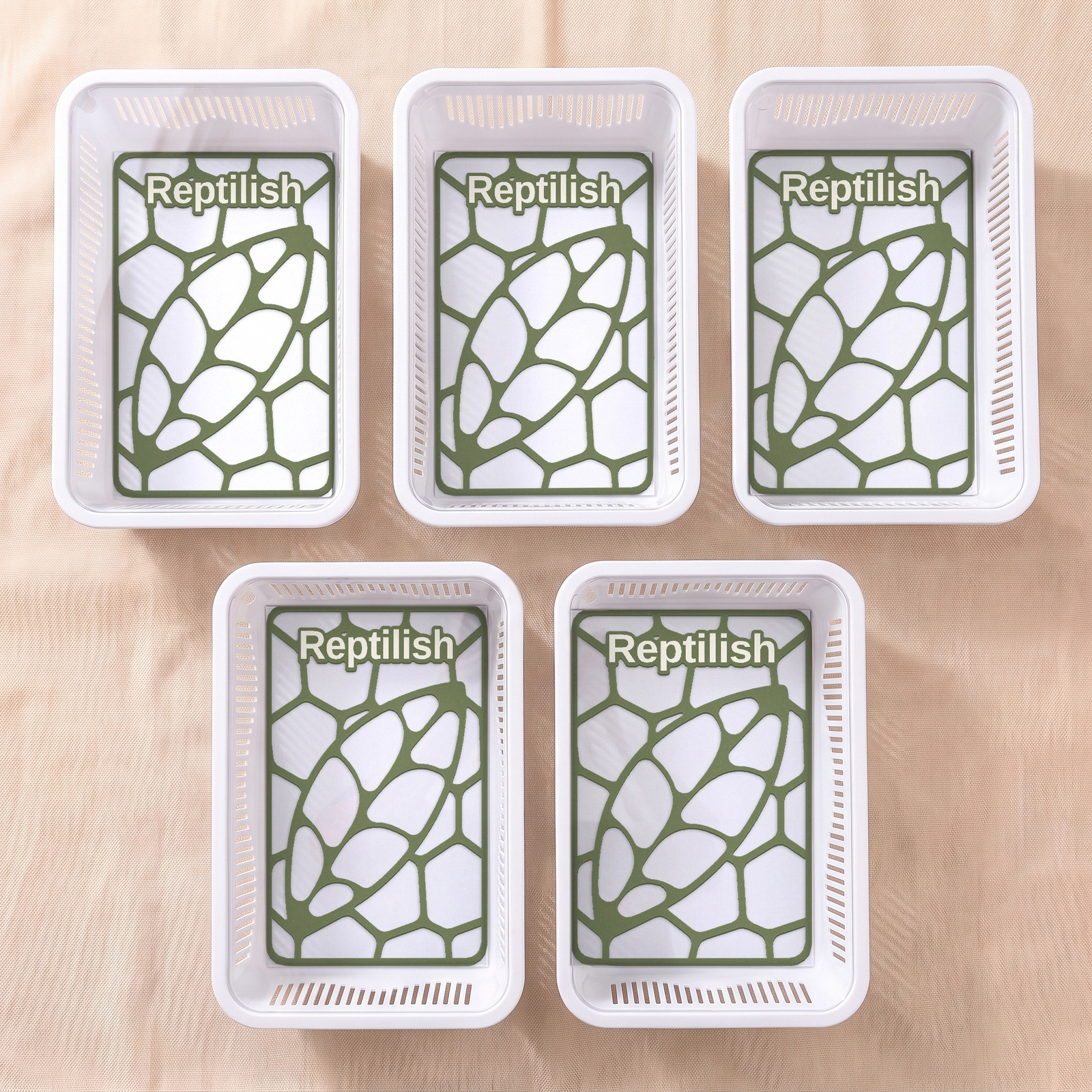 Cinque faunabox bianchi con piastre Pebble Plate in Verde notte